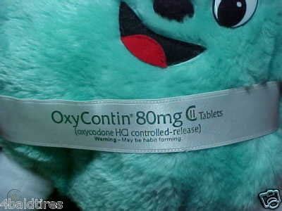 Oxycontin stuffed toy - This is an OxyContine-branded Swiss Army-like contraption on steroids. It is a bottle opener, wrench, scissor, knife, and screwdriver. …